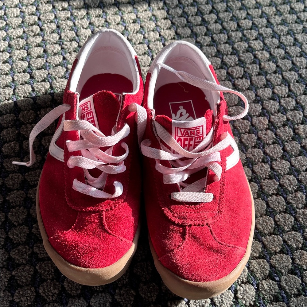 Vans red suede tennis shoes.  Youth size 5.5. Very little wear